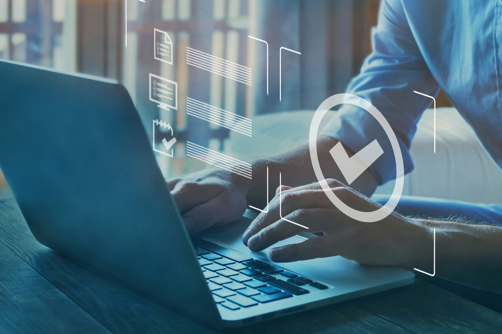 man tiping in a laptop product discovery